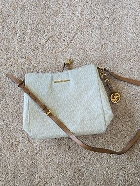 Michael Kors Cream Signature Crossbody Messenger bag with Tan Strap